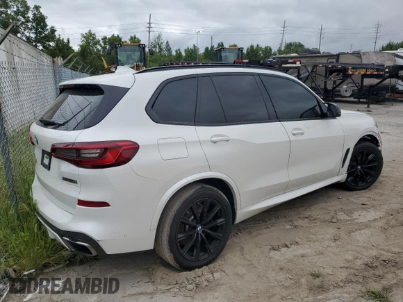 2020 BMW X5 M50i with VIN 5UXJU4C00LLE46181, listed as a Copart auction lot 66190794 with Not Provided miles and Salvage Title. Bid and sale history available at DreamBid. Image 3.