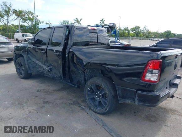 2023 Ram 1500 Big Horn z VIN 1C6RRFBG1PN612321, wystawiony jako IAAI lot #39303273 z przebiegiem 20 647 mil mil oraz . Historia ofert i sprzedaży dostępna na DreamBid. Obrazek 3.