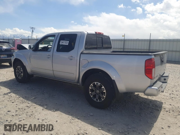 2016 Nissan Frontier S with VIN 1N6AD0EV8GN721786, listed as a Copart auction lot 54417415 with 100,672 mi miles and Salvage title. Bid and sale history available at DreamBid. Image 2.
