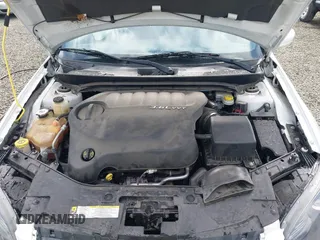 2013 Chrysler 200 Limited with VIN 1C3CCBCG7DN690139, listed as a IAAI auction lot 41744141 with 77,428 mi miles. Bid and sale history available at carsss.com. Image 10.