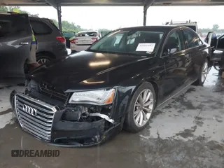 2012 Audi A8 with VIN WAUAVAFD9CN006499, listed as a IAAI auction lot 42461402 with 57,232 mi miles and . Bid and sale history available at DreamBid. Image 17.