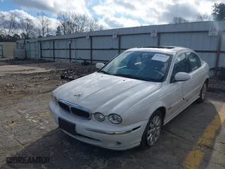 2002 Jaguar X-Type 2.5L Manual with VIN SAJEA51D72XC53610, listed as a IAAI auction lot 41218622 with 139,387 mi miles. Bid and sale history available at carsss.com. Image 17.