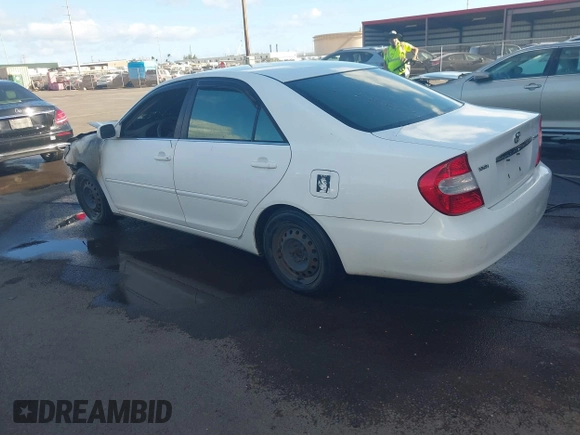 2002 Toyota Camry LE z VIN JTDBE32K120093737, wystawiony jako IAAI lot #41214245 z przebiegiem Nie podano mil oraz . Historia ofert i sprzedaży dostępna na DreamBid. Obrazek 3.