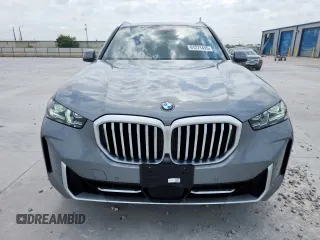 2024 BMW X5 xDrive40i with VIN 5UX23EU09R9T07066, listed as a Copart auction lot 61271495 with 18,042 mi miles and Salvage title. Bid and sale history available at DreamBid. Image 5.