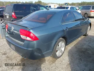 2011 Mercury Milan with VIN 3MEHM0HA2BR601822, listed as a IAAI auction lot 41282889 with 214,389 mi miles. Bid and sale history available at carsss.com. Image 4.