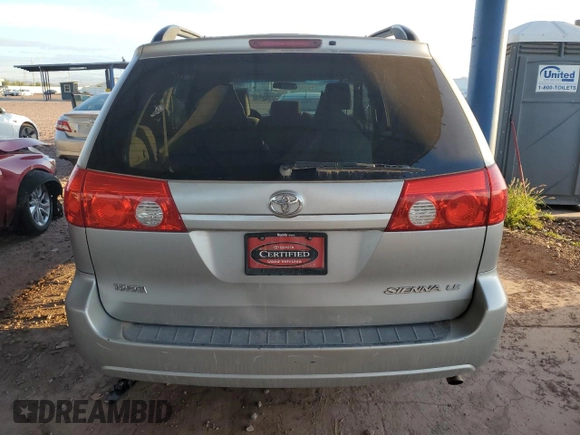 2010 Toyota Sienna CE with VIN 5TDKK4CC6AS329753, listed as a Copart auction lot 54374515 with 144,654 mi miles and Salvage Title. Bid and sale history available at DreamBid. Image 6.