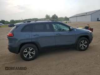 2014 Jeep Cherokee Trailhawk with VIN 1C4PJMBS4EW160341, listed as a Copart auction lot 60761475 with 135,087 mi miles and Salvage title. Bid and sale history available at DreamBid. Image 3.