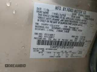 2007 Ford Five Hundred SEL z VIN 1FAHP27137G141919, wystawiony jako Copart lot #88551615 z przebiegiem 151 723 mil mil oraz Szkoda całkowita • Salvage title. Historia ofert i sprzedaży dostępna na DreamBid. Obrazek 13.