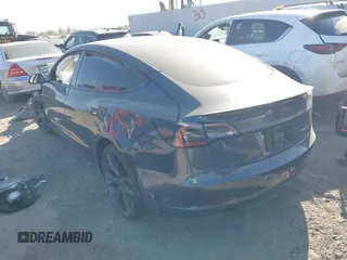 2022 Tesla Model 3 Performance with VIN 5YJ3E1EC3NF194197, listed as a IAAI auction lot 41825401 with Not Provided miles and . Bid and sale history available at DreamBid. Image 3.