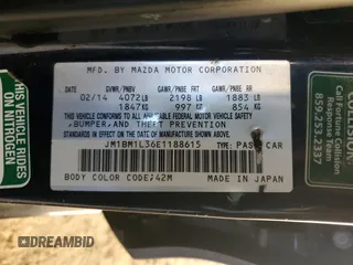 2014 Mazda 3 S Touring with VIN JM1BM1L36E1188615, listed as a Copart auction lot 80682274 with 84,888 mi miles and Salvage Title. Bid and sale history available at DreamBid. Image 14.