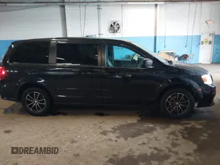 2016 Dodge Grand Caravan SXT z VIN 2C4RDGCG3GR107802, wystawiony jako IAAI lot #42309365 z przebiegiem 57 427 mil mil oraz . Historia ofert i sprzedaży dostępna na DreamBid. Obrazek 13.