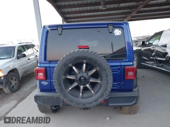 2018 Jeep Wrangler Unlimited Sahara z VIN 1C4HJXEN0JW274942, wystawiony jako IAAI lot #41175231 z przebiegiem 97 255 mil mil oraz . Historia ofert i sprzedaży dostępna na DreamBid. Obrazek 16.