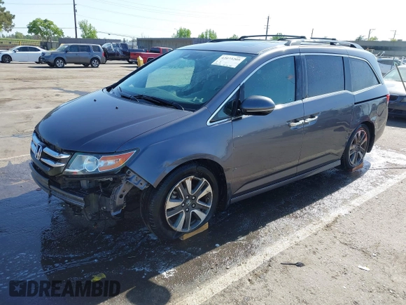2015 Honda Odyssey Touring Elite с VIN 5FNRL5H93FB056183, выставлен на аукционе IAAI как лот 42073205 с пробегом 119 874 миль миль и . История ставок и продаж доступна на DreamBid. Изображение 18.