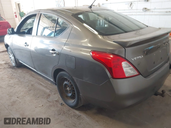 2014 Nissan Versa SV with VIN 3N1CN7AP6EL821104, listed as a IAAI auction lot 41773957 with 167,287 mi miles. Bid and sale history available at carsss.com. Image 3.