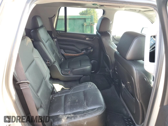 2015 Chevrolet Tahoe LTZ z VIN 1GNSKCKC5FR100084, wystawiony jako Copart lot #68003764 z przebiegiem Nie podano mil oraz Czysty tytuł • Clean title. Historia ofert i sprzedaży dostępna na DreamBid. Obrazek 11.