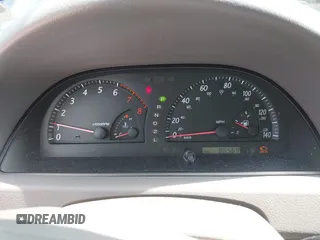 2002 Toyota Camry LE z VIN 4T1BE30KX2U591037, wystawiony jako IAAI lot #42077641 z przebiegiem 86 569 mil mil oraz . Historia ofert i sprzedaży dostępna na DreamBid. Obrazek 7.