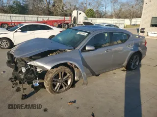 2014 Dodge Avenger SXT z VIN 1C3CDZCG8EN176324, wystawiony jako Copart lot #49325595 z przebiegiem 153 451 mil mil oraz Szkoda całkowita • Salvage title. Historia ofert i sprzedaży dostępna na DreamBid. Obrazek 1.