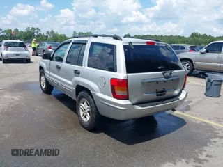 2004 Jeep Grand Cherokee Laredo with VIN 1J4GX48S34C258227, listed as a IAAI auction lot 42616107 with 160,424 mi miles and . Bid and sale history available at DreamBid. Image 3.