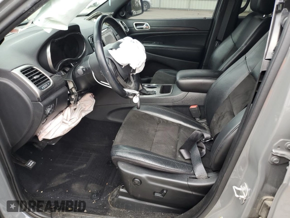 2020 Jeep Grand Cherokee Laredo E with VIN 1C4RJEAG0LC404979, listed as a Copart auction lot 81999474 with 57,328 mi miles and Salvage title. Bid and sale history available at DreamBid. Image 7.