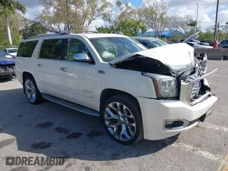 2015 GMC Yukon XL Denali with VIN 1GKS1JKJ0FR504266, listed as a IAAI auction lot 41564098 with 148,203 mi miles. Bid and sale history available at carsss.com. Image 1.