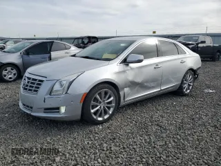 2014 Cadillac XTS Luxury with VIN 2G61M5S31E9199735, listed as a Copart auction lot 48364395 with 99,841 mi miles and Salvage Title. Bid and sale history available at DreamBid. Image 1.