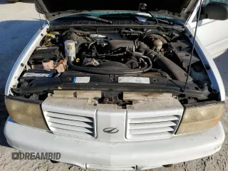 1999 Oldsmobile Bravada z VIN 1GHDT13W1X2704151, wystawiony jako Copart lot #76802764 z przebiegiem 155 630 mil mil oraz Szkody całkowita. Historia ofert i sprzedaży dostępna na DreamBid. Obrazek 12.