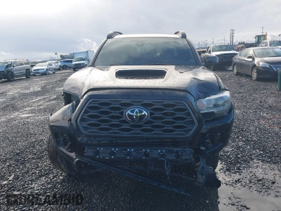 2020 Toyota Tacoma SR5 z VIN 5TFCZ5AN9LX216032, wystawiony jako IAAI lot #41448197 z przebiegiem 128 581 mil mil oraz . Historia ofert i sprzedaży dostępna na DreamBid. Obrazek 13.