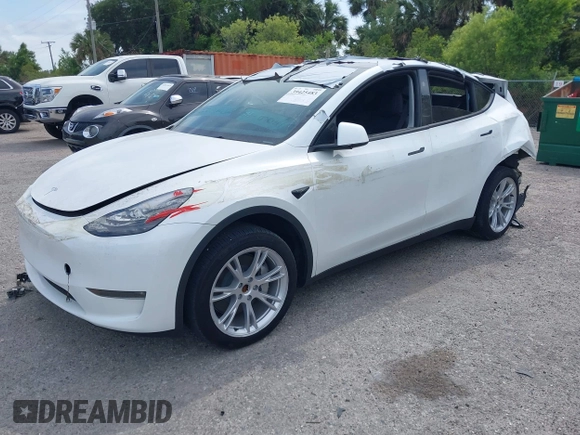 2023 Tesla Model Y Long Range with VIN 7SAYGDEE3PA206757, listed as a IAAI auction lot 39425483 with 5,711 mi miles and . Bid and sale history available at DreamBid. Image 17.