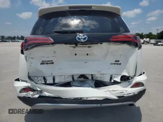 2018 Toyota RAV4 Hybrid SE with VIN JTMJJREVXJD212926, listed as a Copart auction lot 60215465 with 71,876 mi miles and Salvage title. Bid and sale history available at DreamBid. Image 6.