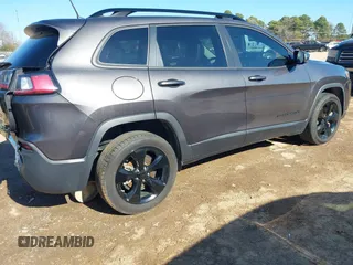 2020 Jeep Cherokee Latitude Plus with VIN 1C4PJLLB0LD648493, listed as a IAAI auction lot 41224900 with 70,995 mi miles. Bid and sale history available at carsss.com. Image 4.