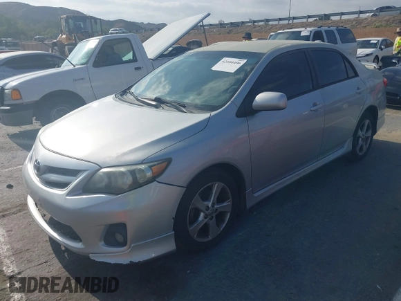 2012 Toyota Corolla L with VIN 5YFBU4EE7CP067875, listed as a IAAI auction lot 42104406 with 277,607 mi miles. Bid and sale history available at carsss.com. Image 17.