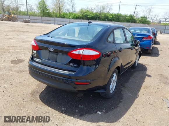 2019 Ford Fiesta SE with VIN 3FADP4BJ2KM165435, listed as a IAAI auction lot 42077508 with 118,784 mi miles. Bid and sale history available at carsss.com. Image 4.