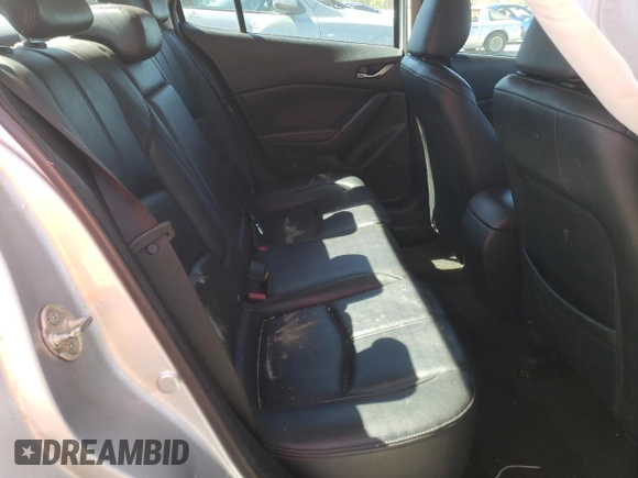 2017 Mazda 3 Touring z VIN 3MZBN1V79HM119726, wystawiony jako Copart lot #60819782 z przebiegiem 108 939 mil mil oraz Szkoda całkowita • Salvage title. Historia ofert i sprzedaży dostępna na DreamBid. Obrazek 6.