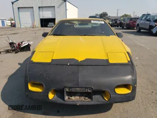 1986 Pontiac Fiero z VIN 1G2PG9796GP256622, wystawiony jako Copart lot #69203894 z przebiegiem 38 964 mil mil oraz Szkody całkowita. Historia ofert i sprzedaży dostępna na DreamBid. Obrazek 5.