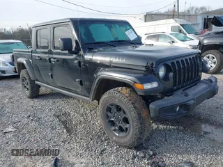 2023 Jeep Gladiator Sport S z VIN 1C6HJTAG7PL567903, wystawiony jako IAAI lot #41574387 z przebiegiem 49 378 mil mil oraz . Historia ofert i sprzedaży dostępna na DreamBid. Obrazek 1.