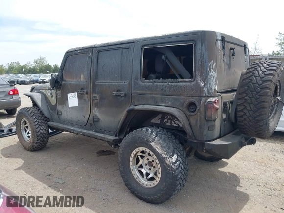 2016 Jeep Wrangler Unlimited Sahara z VIN 1C4HJWEG4GL261147, wystawiony jako IAAI lot #42239252 z przebiegiem 69 604 mil mil oraz . Historia ofert i sprzedaży dostępna na DreamBid. Obrazek 3.
