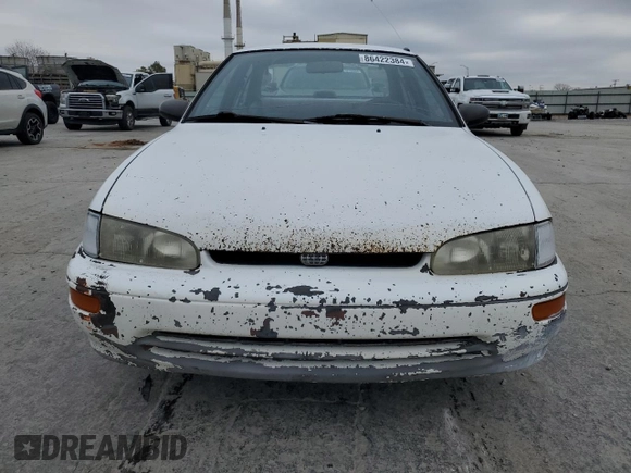 1997 Geo Prizm z VIN 1Y1SK526XVZ437486, wystawiony jako Copart lot #86422384 z przebiegiem 404 485 mil mil oraz Tytuł czysty. Historia ofert i sprzedaży dostępna na DreamBid. Obrazek 5.