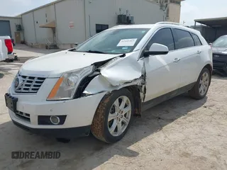 2013 Cadillac SRX Performance Collection z VIN 3GYFNDE30DS648288, wystawiony jako IAAI lot #41955462 z przebiegiem 135 956 mil mil oraz . Historia ofert i sprzedaży dostępna na DreamBid. Obrazek 2.