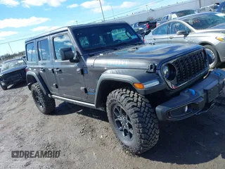 2024 Jeep Wrangler Willys z VIN 1C4RJXN61RW322456, wystawiony jako IAAI lot #41747226 z przebiegiem 2 043 mil mil oraz . Historia ofert i sprzedaży dostępna na DreamBid. Obrazek 1.