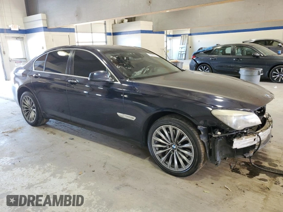 2011 BMW 7 Series 740i with VIN WBAKA4C53BC392488, listed as a Copart auction lot 77876674 with 0 mi miles and Salvage Title. Bid and sale history available at carsss.com. Image 4.