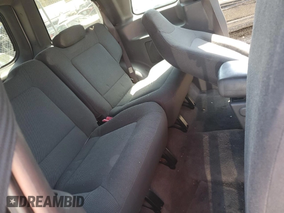 2001 Ford Explorer Sport z VIN 1FMYU60E01UC94401, wystawiony jako Copart lot #53658415 z przebiegiem 75 660 mil mil oraz Szkody całkowita. Historia ofert i sprzedaży dostępna na DreamBid. Obrazek 11.