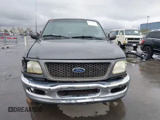 2003 Ford F-150 XL with VIN 1FTRX17W03NB51687, listed as a IAAI auction lot 41712022 with 183,428 mi miles. Bid and sale history available at carsss.com. Image 12.
