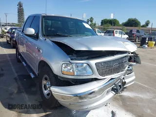 2003 Ford F-150 XLT with VIN 1FTRW07L93KD50788, listed as a IAAI auction lot 42464225 with 189,711 mi miles and . Bid and sale history available at DreamBid. Image 1.