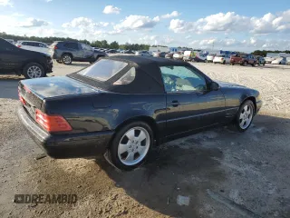 1999 Mercedes-Benz SL-Class with VIN WDBFA68F0XF186163, listed as a Copart auction lot 82669544 with 184,054 mi miles and Salvage Title. Bid and sale history available at carsss.com. Image 3.