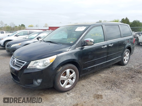2011 Volkswagen Routan z VIN 2V4RW6DG6BR695681, wystawiony jako IAAI lot #42078872 z przebiegiem 141 730 mil mil oraz . Historia ofert i sprzedaży dostępna na DreamBid. Obrazek 2.
