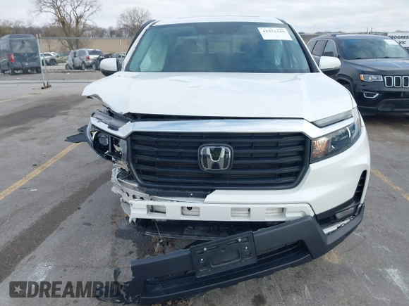 2023 Honda Ridgeline RTL with VIN 5FPYK3F55PB018188, listed as a IAAI auction lot 41952319 with 73,019 mi miles and . Bid and sale history available at DreamBid. Image 12.