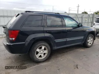 2007 Jeep Grand Cherokee Laredo with VIN 1J8GR48K77C569155, listed as a Copart auction lot 66904414 with 171,064 mi miles and Salvage Title. Bid and sale history available at carsss.com. Image 3.