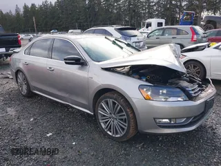 2014 Volkswagen Passat SE z VIN 1VWBT7A31EC100743, wystawiony jako IAAI lot #41786342 z przebiegiem 99 338 mil mil oraz . Historia ofert i sprzedaży dostępna na DreamBid. Obrazek 1.