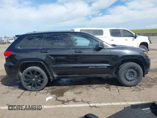2014 Jeep Grand Cherokee Overland with VIN 1C4RJFCT8EC106005, listed as a IAAI auction lot 41989721 with 148,469 mi miles and . Bid and sale history available at DreamBid. Image 14.