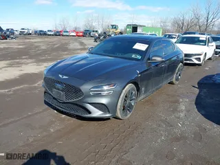 2023 Genesis G70 2.0T with VIN KMTG34TA9PU109174, listed as a IAAI auction lot 41582887 with 72,996 mi miles. Bid and sale history available at carsss.com. Image 2.
